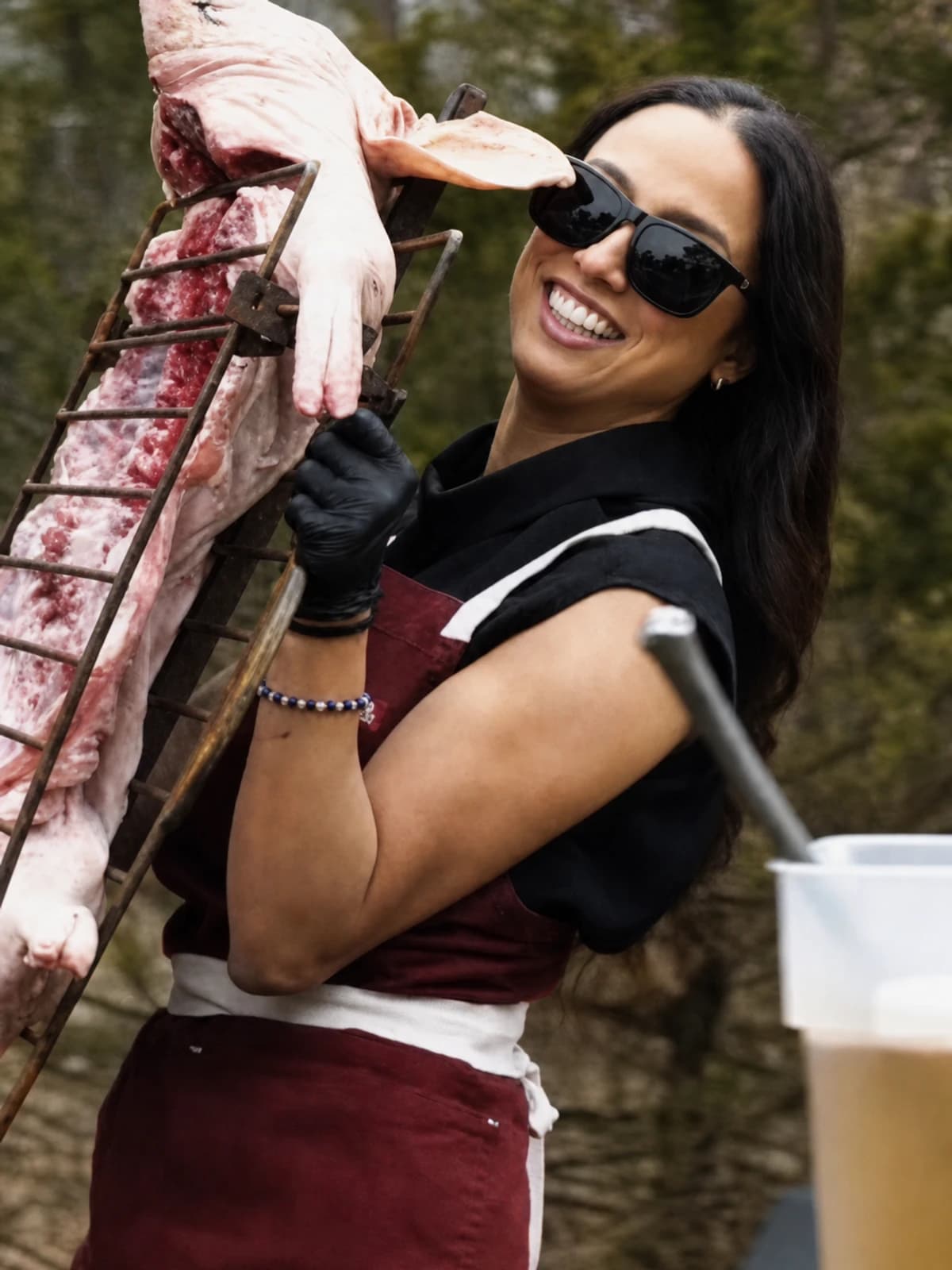 Alexandra Donnadio cooking whole-animal barbecue over live fire